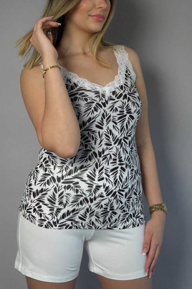 Pyjama chaud en coton à motif noir et blanc, style débardeur avec dentelle, parfait pour tenue d'intérieur.