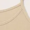 nude-beige-essential-spaghetti-strap-tank-top-close-up Pyjama satin beige en coton doux, idéal pour une tenue d'intérieur élégante et confortable pour vos nuits.