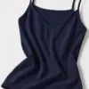 top-fines-bretelles-essential-front-evening-blue Délicat pyjama en coton bleu nuit, style décontracté, idéal pour une confortable tenue d'intérieur élégante.