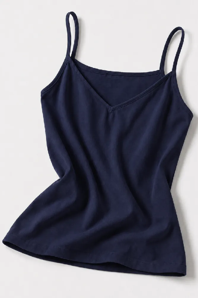 top-fines-bretelles-essential-front-evening-blue Délicat pyjama en coton bleu nuit, style décontracté, idéal pour une confortable tenue d'intérieur élégante.